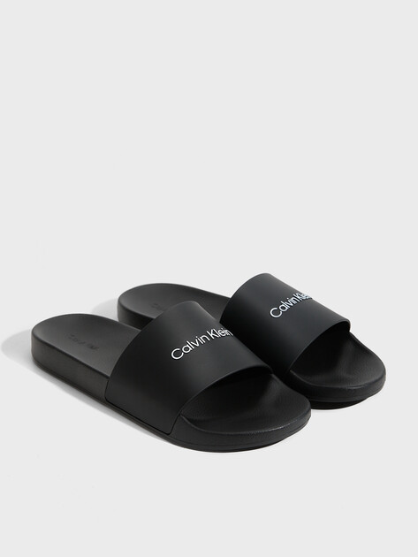 Мужские сланцы CALVIN KLEIN POOL SLIDE, Артикул HM0HM00455, черный | 2846184. Ракурс 2 Мужские сланцы CALVIN KLEIN POOL SLIDE, Артикул HM0HM00455, черный | 2846184. Ракурс 2