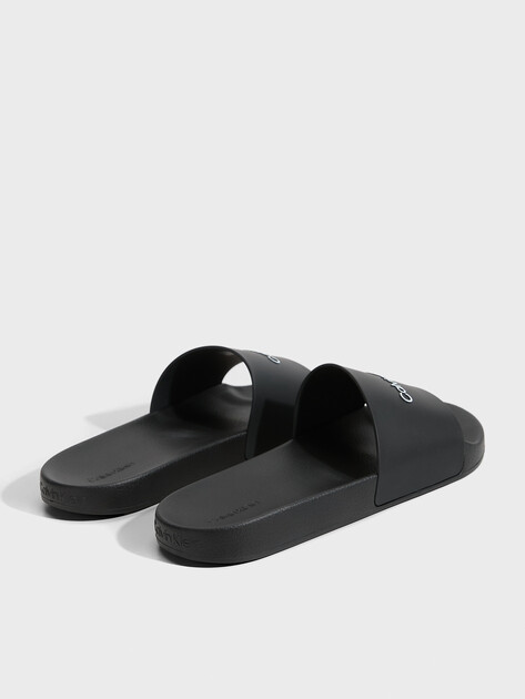 Мужские сланцы CALVIN KLEIN POOL SLIDE, Артикул HM0HM00455, черный | 2846184. Ракурс 5 Мужские сланцы CALVIN KLEIN POOL SLIDE, Артикул HM0HM00455, черный | 2846184. Ракурс 5