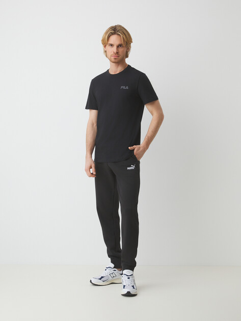 Мужские брюки PUMA ESS No. 1 Logo Sweatpants TR, Артикул 682608, черный | 4300902. Ракурс 2 Мужские брюки PUMA ESS No. 1 Logo Sweatpants TR, Артикул 682608, черный | 4300902. Ракурс 2