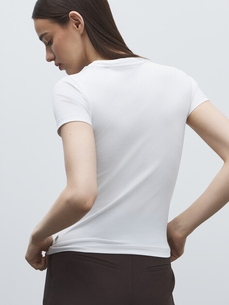 Женская футболка GUESS JEANS GJ SS CN SLIM AMERICAN TR TEE, Артикул W4YI03J1314, белый | 4803699. Ракурс 4 Женская футболка GUESS JEANS GJ SS CN SLIM AMERICAN TR TEE, Артикул W4YI03J1314, белый | 4803699. Ракурс 4