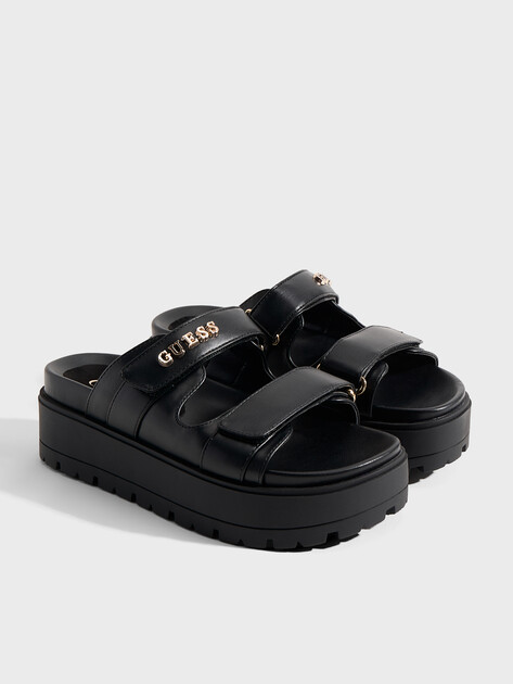 Женские шлепанцы GUESS FAXON, Артикул FLJFAXELE03, черный | 4906128. Ракурс 2 Женские шлепанцы GUESS FAXON, Артикул FLJFAXELE03, черный | 4906128. Ракурс 2