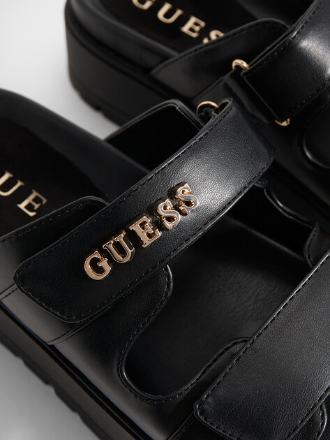 Женские шлепанцы GUESS FAXON, Артикул FLJFAXELE03, черный | 4906128. Ракурс 3 Женские шлепанцы GUESS FAXON, Артикул FLJFAXELE03, черный | 4906128. Ракурс 3