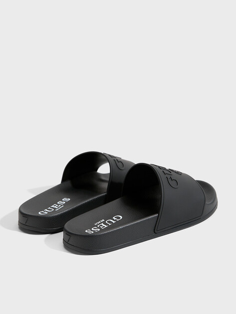 Женские сланцы GUESS SLIPPERS, Артикул E6GZ17BB00F, черный | 4915240. Ракурс 5 Женские сланцы GUESS SLIPPERS, Артикул E6GZ17BB00F, черный | 4915240. Ракурс 5