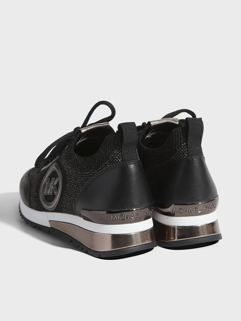 Женские кроссовки-носки MICHAEL KORS Jenkins Metallic Stretch Knit Trainer, Артикул 49H3JNFS3D, черный | 4940288. Ракурс 5 Женские кроссовки-носки MICHAEL KORS Jenkins Metallic Stretch Knit Trainer, Артикул 49H3JNFS3D, черный | 4940288. Ракурс 5