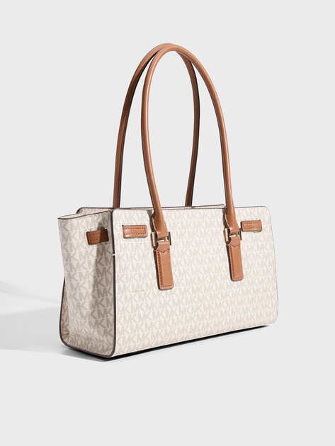 Женский тоут MICHAEL KORS SM EW SHLDR TOTE W CHARM, Артикул 30F5GNXT0B(K), светло-бежевый | 4969512. Ракурс 3
