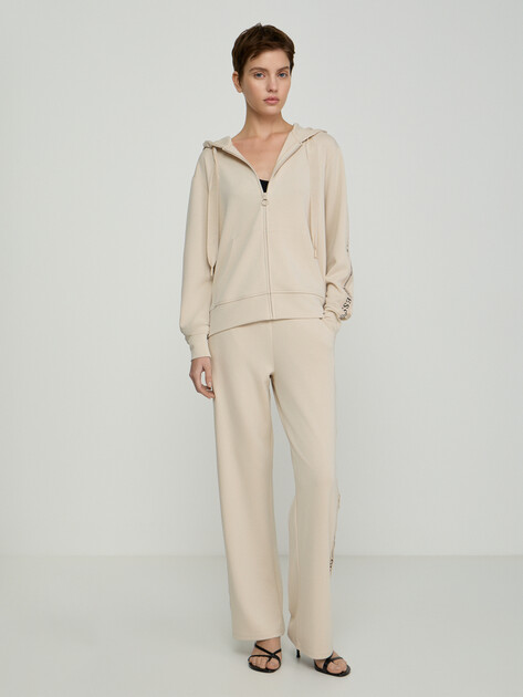 Женские широкие брюки  GUESS GUESSXNS SWEAT PANTS, Артикул W6GB29K3282, светло-бежевый | 5215269. Ракурс 1